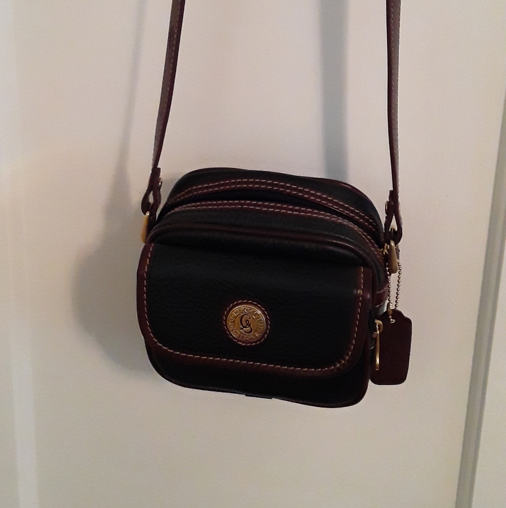 Henson collections crossbody bag.   Forrest green trim in brown.